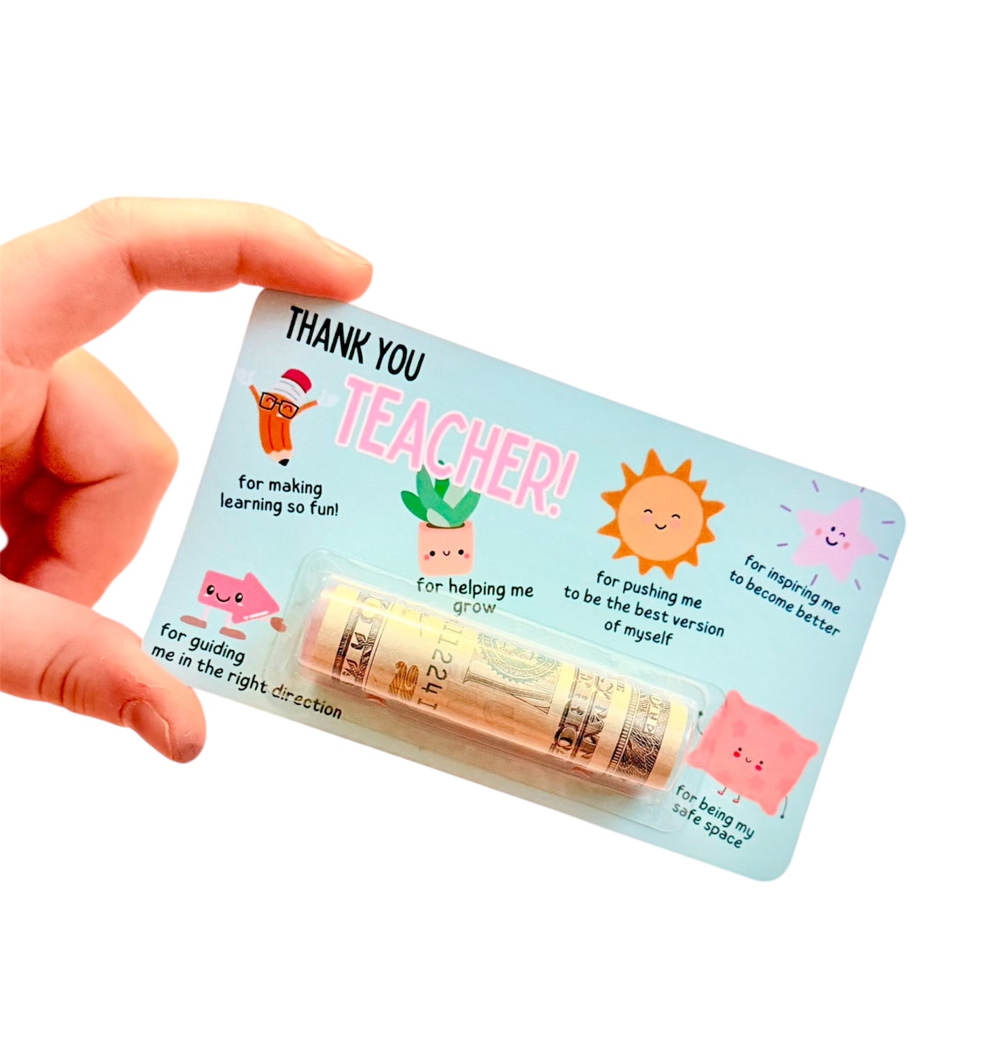 Hand holding a card with 'Thank You Teacher!' message and a small tube of cash