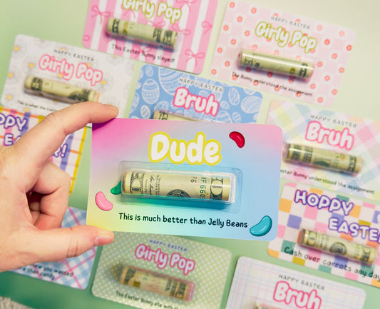 Hand holding a card with rolled-up money labeled 'Dude' against a colorful background with similar cards.