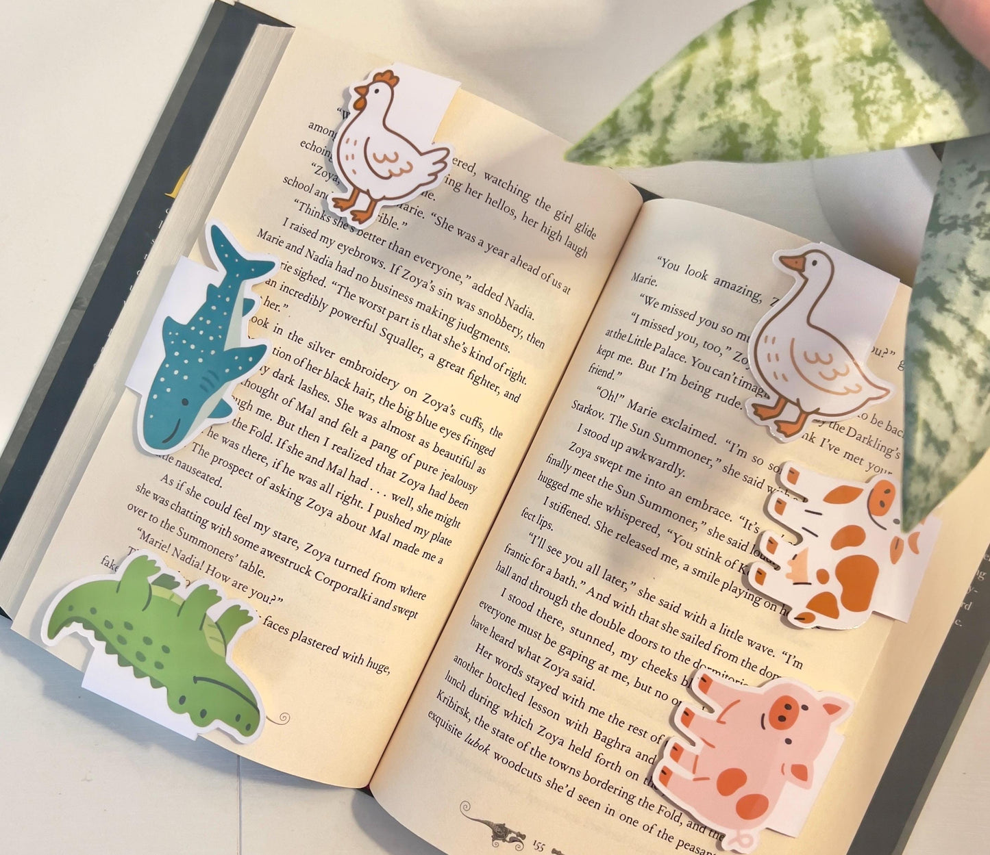 An image that shows a bunch of different cute cartoon animals as bookmarks