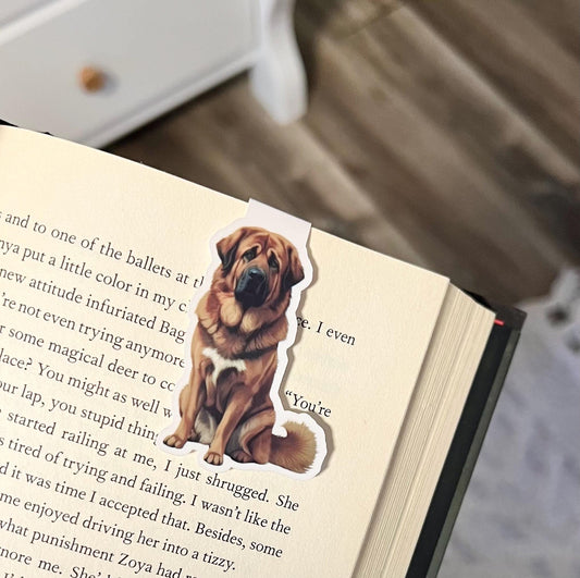 Magnetic bookmark of a semi realistic, cartoon style brown Tibetan mastiff dog