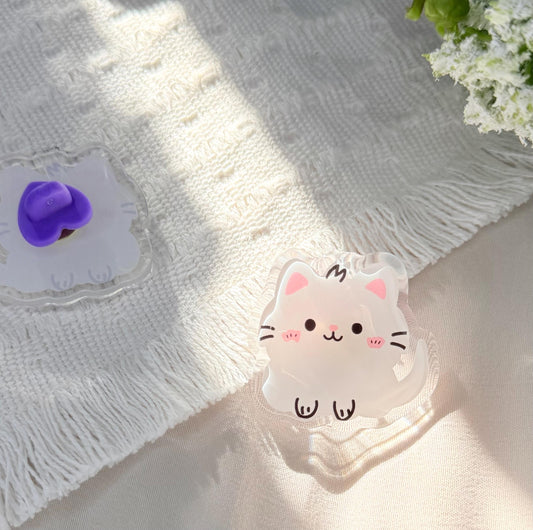 An acrylic pen of a Kawaii style white kitten