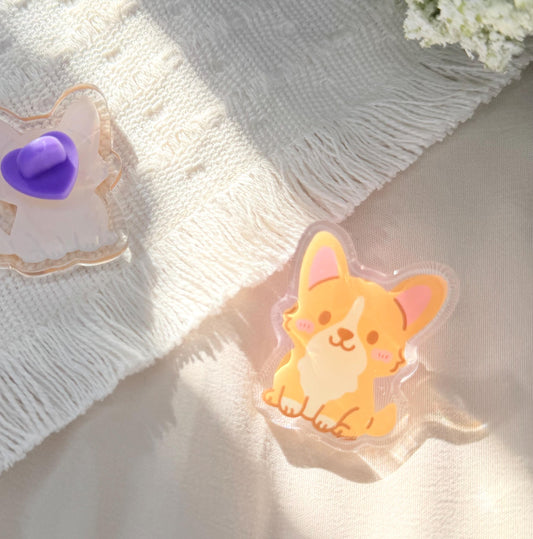 An acrylic pen of a Kawaii style corgi dog