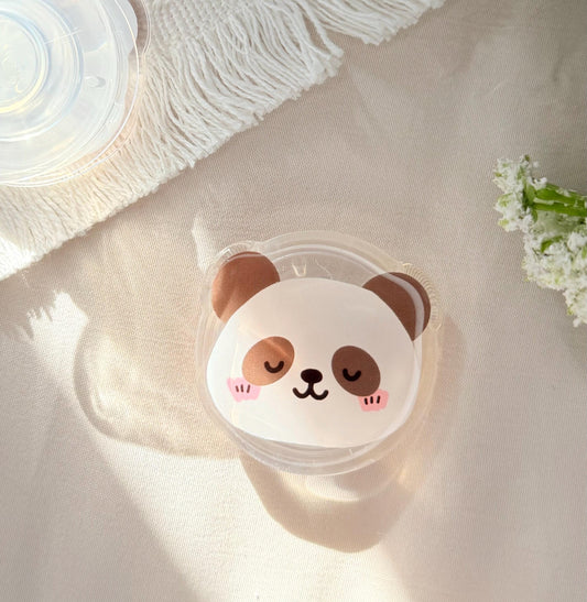 An acrylic foam grip of a Kawaii style panda face