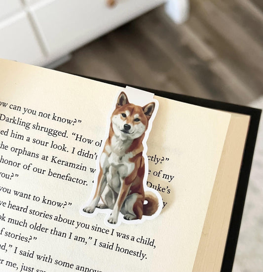 A magnetic bookmark of a semi realistic, cartoon style, Shiba Inu