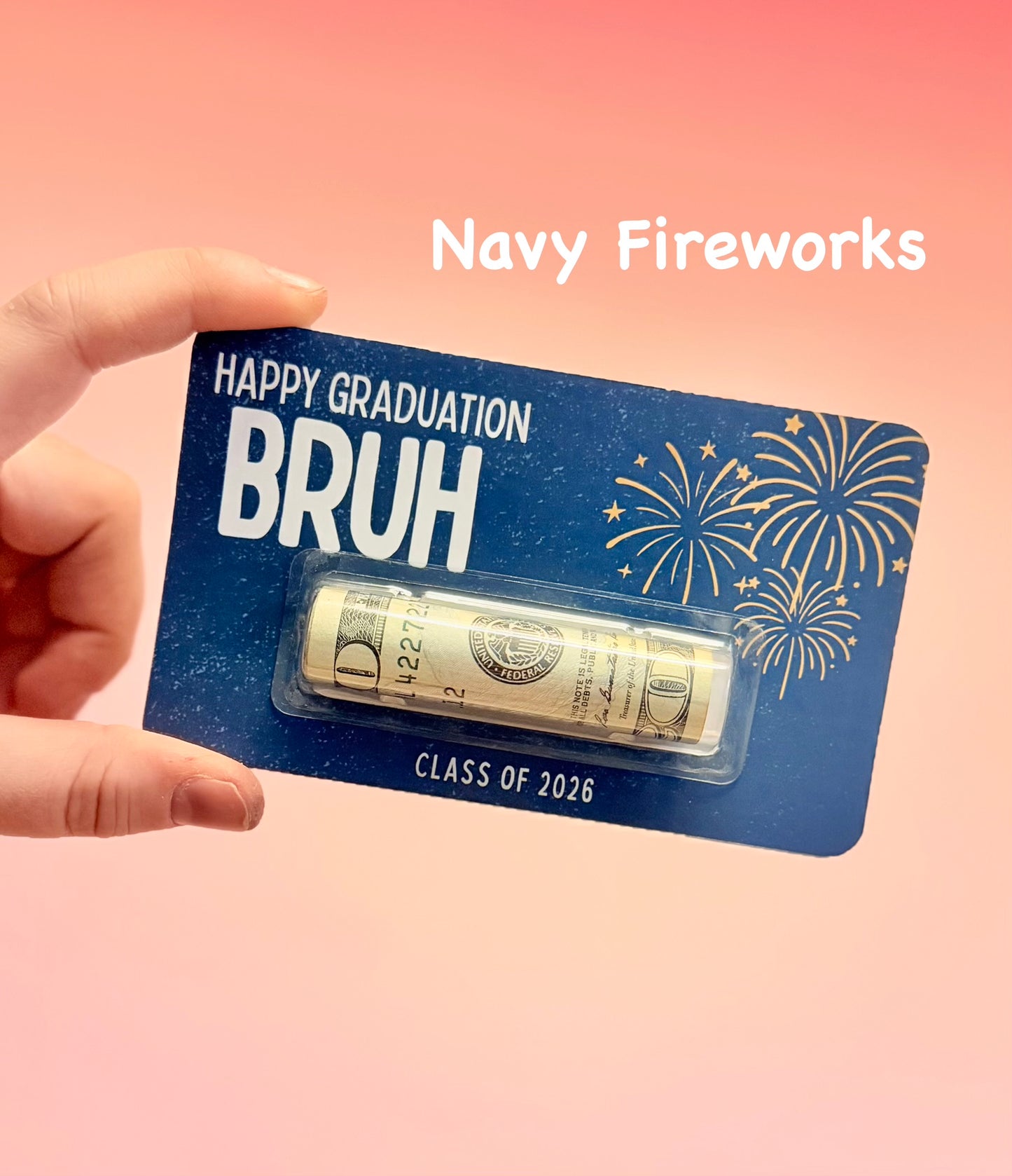 Graduation-themed money roll with 'Happy Graduation Bruh' text on a blue card against a pink background.