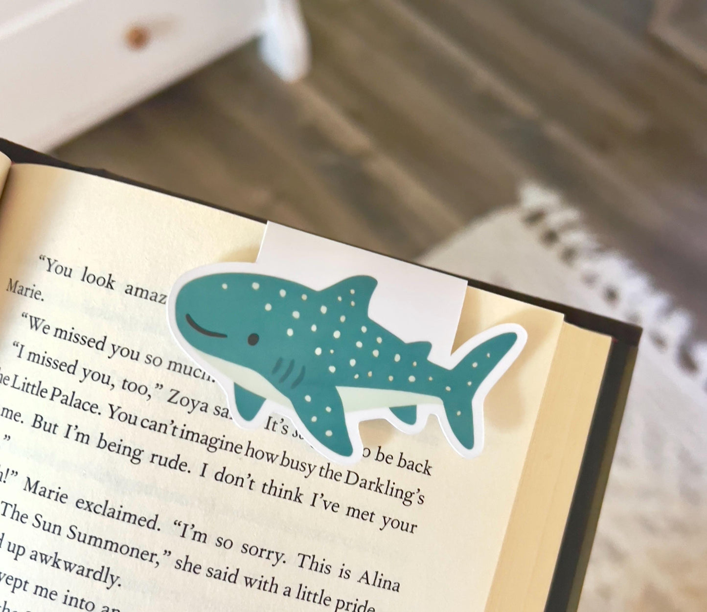 A magnetic bookmark of a simple, cartoon style blue whale shark