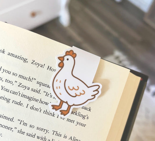 A magnetic bookmark of a cartoon style plain white chicken