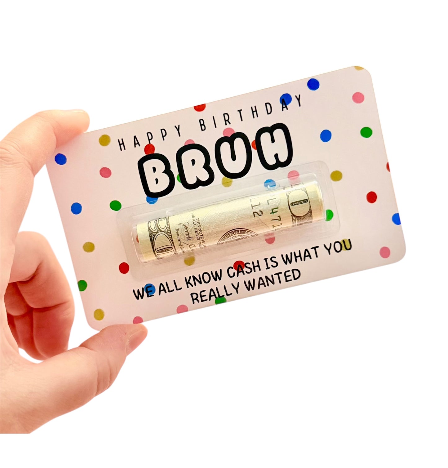 Hand holding a card with rolled-up dollar bills and humorous text on a white background