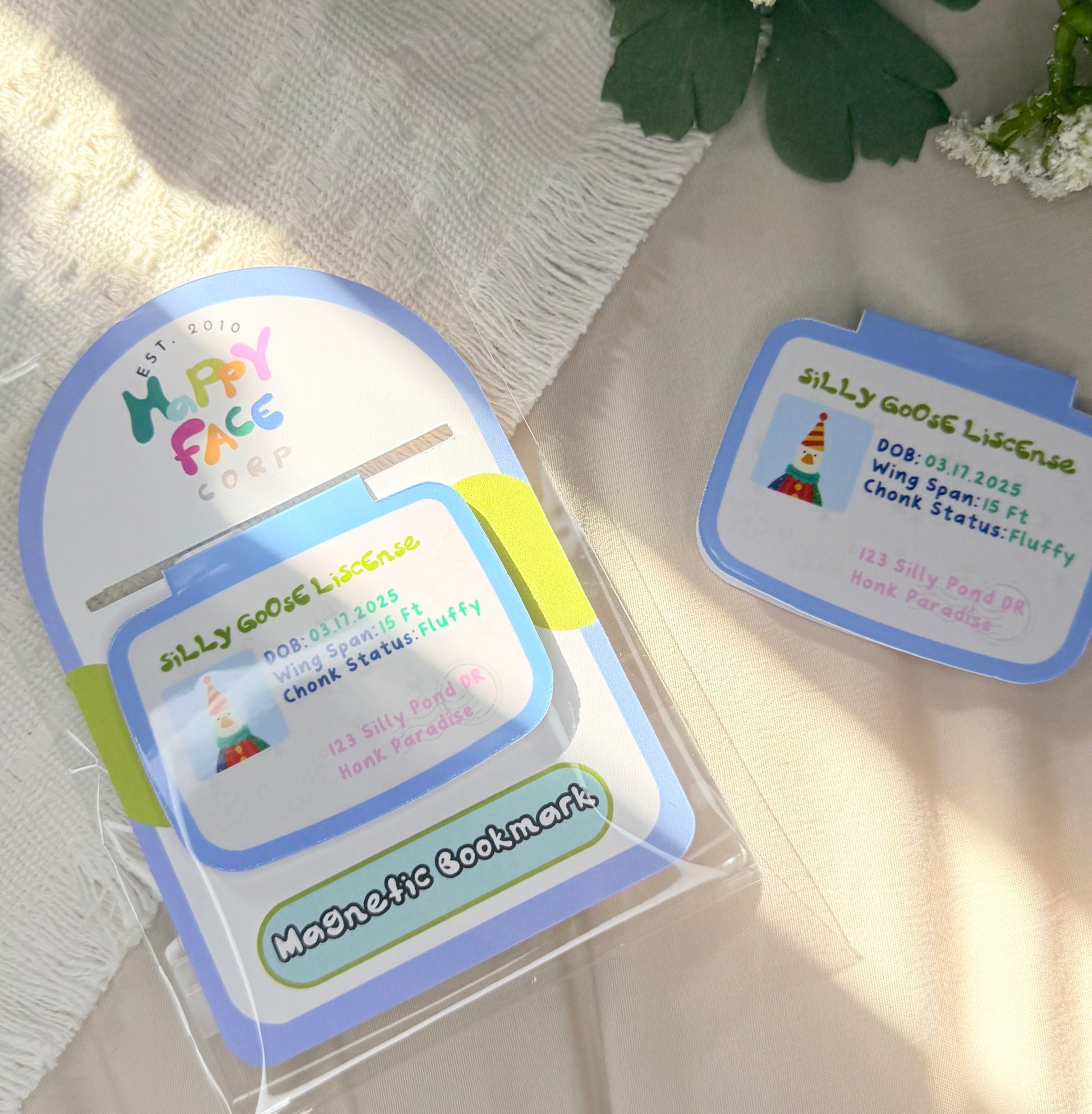 silly goose magnetic bookmark of his license wearing a colorful clown costume