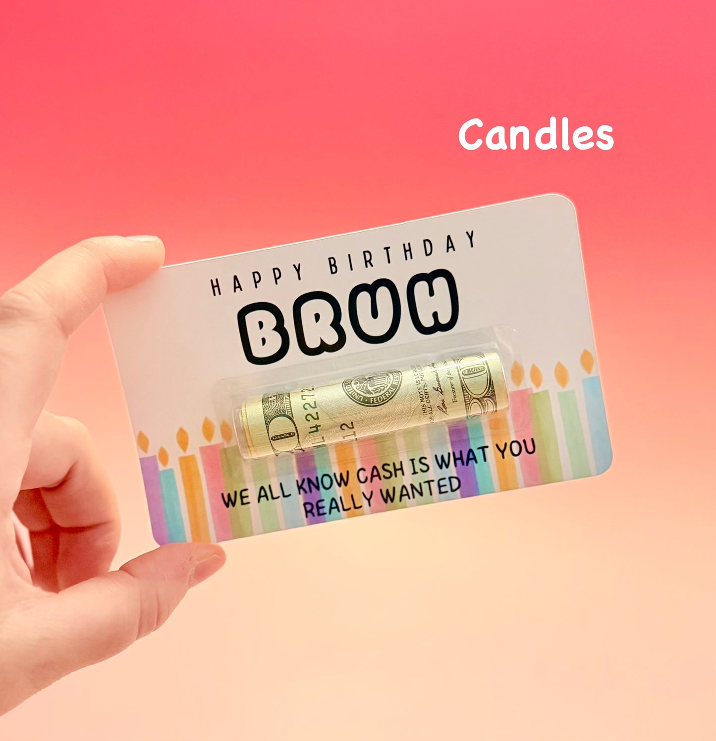 Gift card with cash roll and birthday-themed text on a pink background