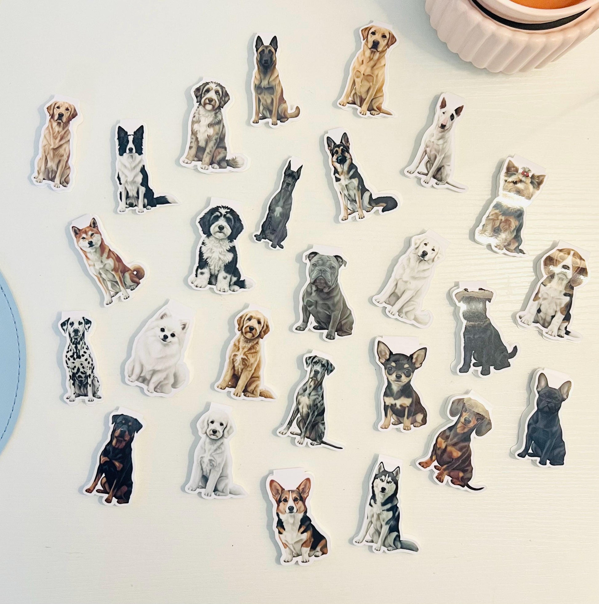 This is a picture of several different dog styles for the magnetic bookmarks