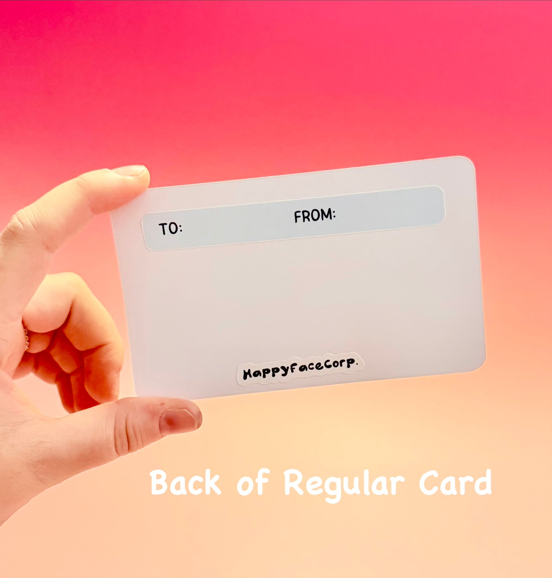 Hand holding a card with 'HappyfaceCorp' branding against a gradient background