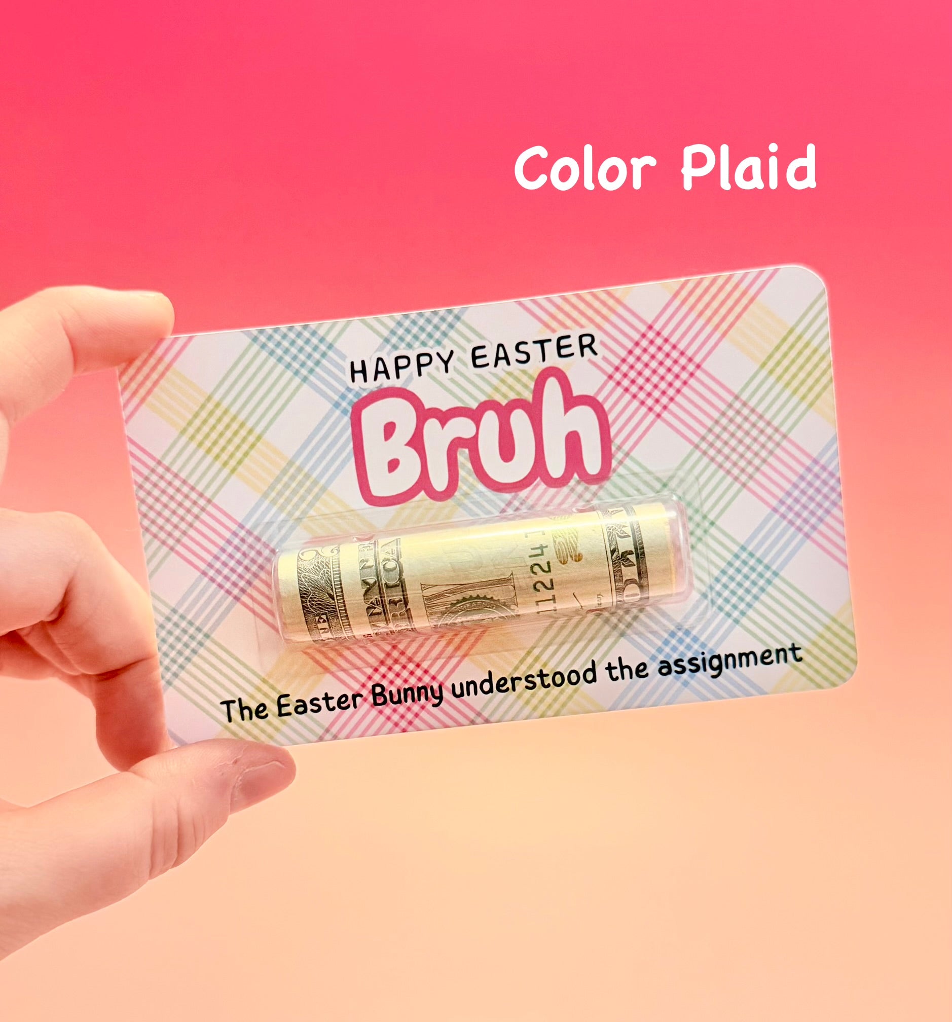 Color plaid Easter card with rolled-up money and text on a pink background