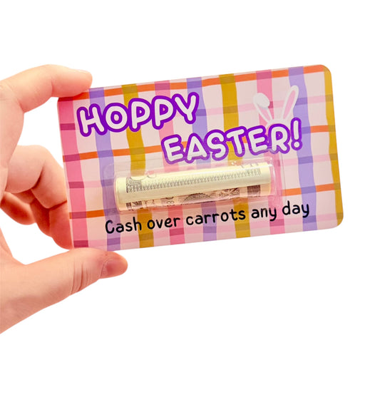 Colorful checkbook cover with 'Happy Easter!' text held by a hand on a white background