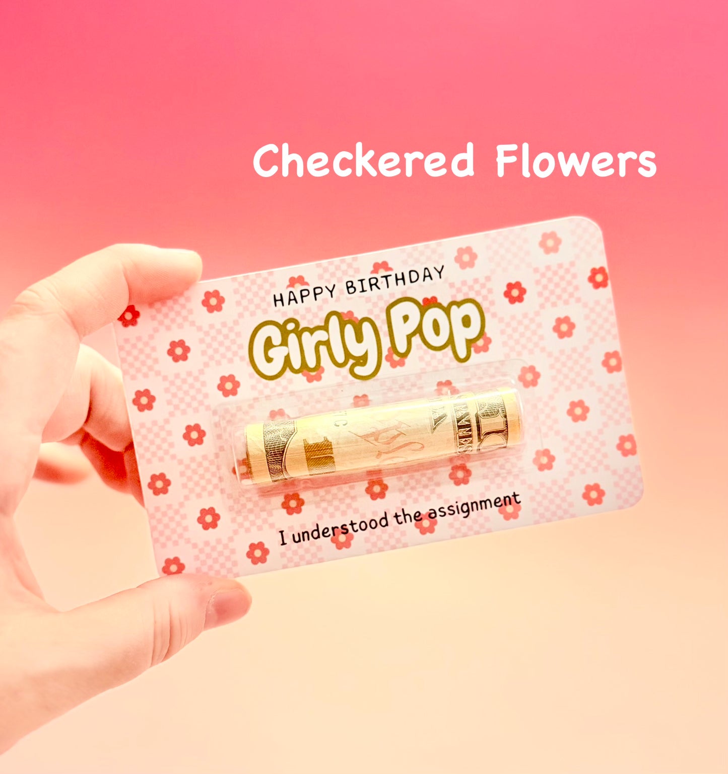 Hand holding a product with 'Happy Birthday Girly Pop' text on a pink background