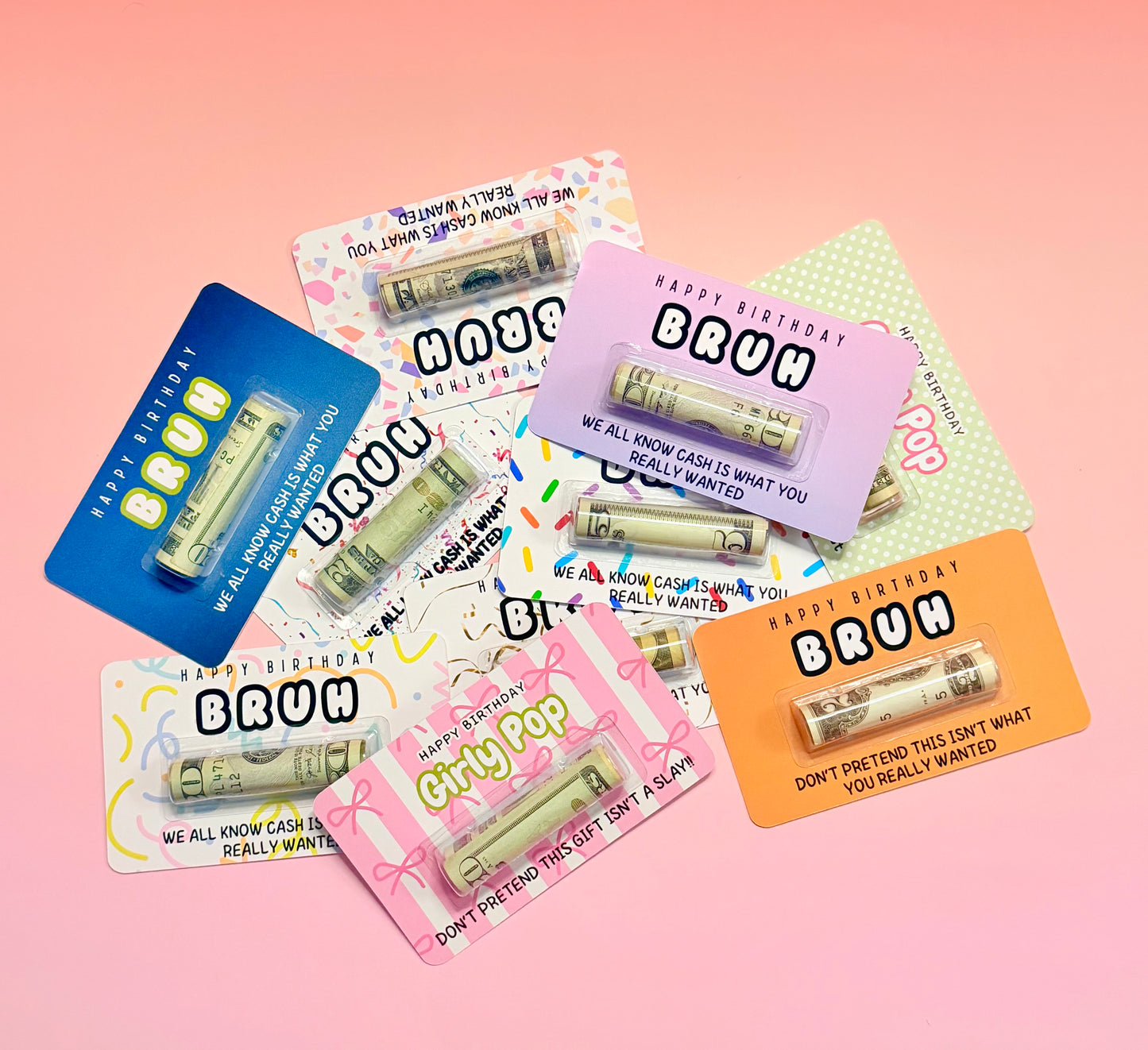 Set of novelty cards with cash designs on a pink background