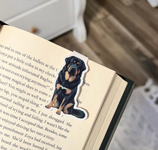 Magnetic bookmark of a semi realistic, cartoon style black Tibetan mastiff dog