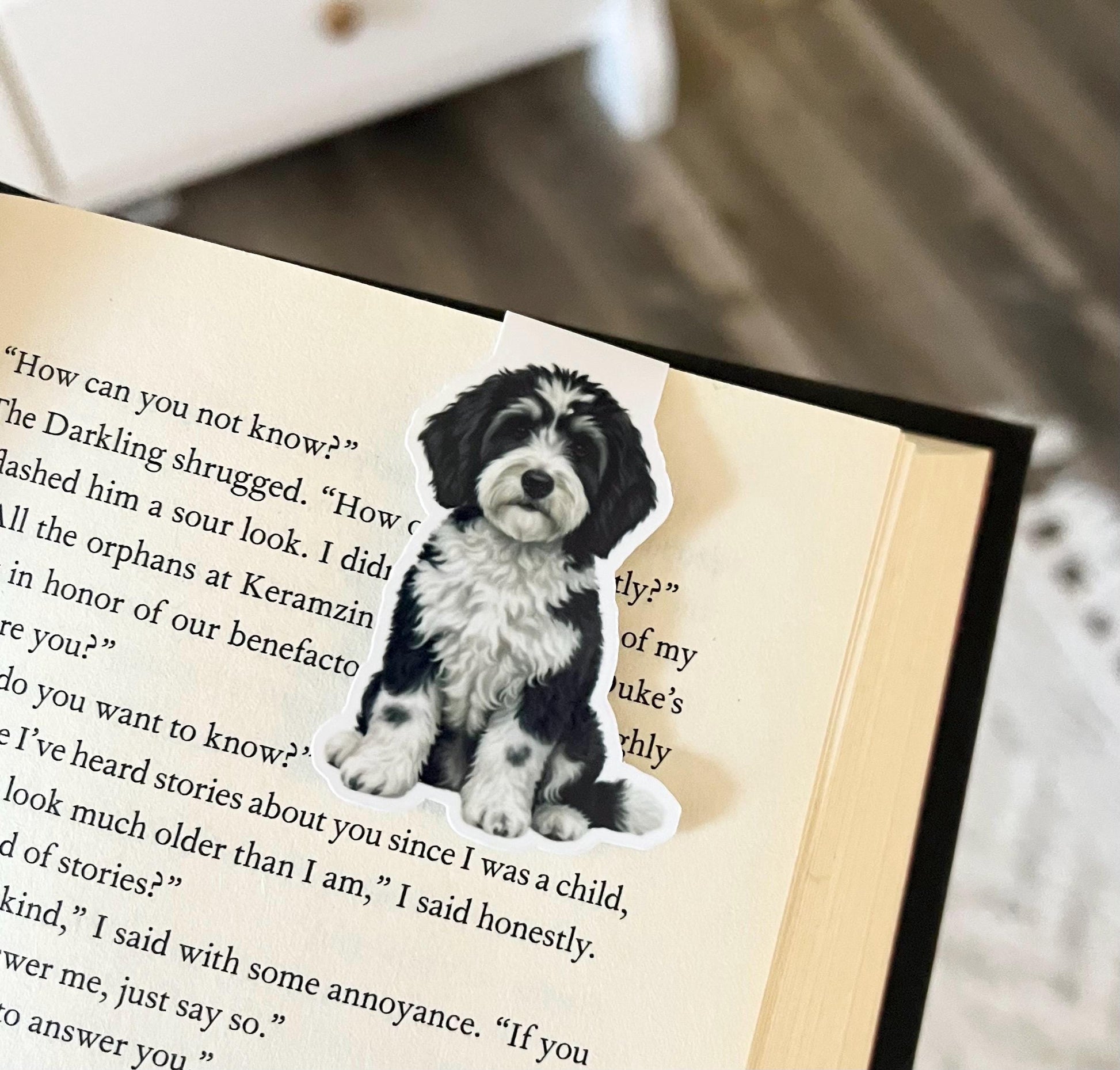A magnetic bookmark of a semi-realistic, cartoon style old English sheepdog
