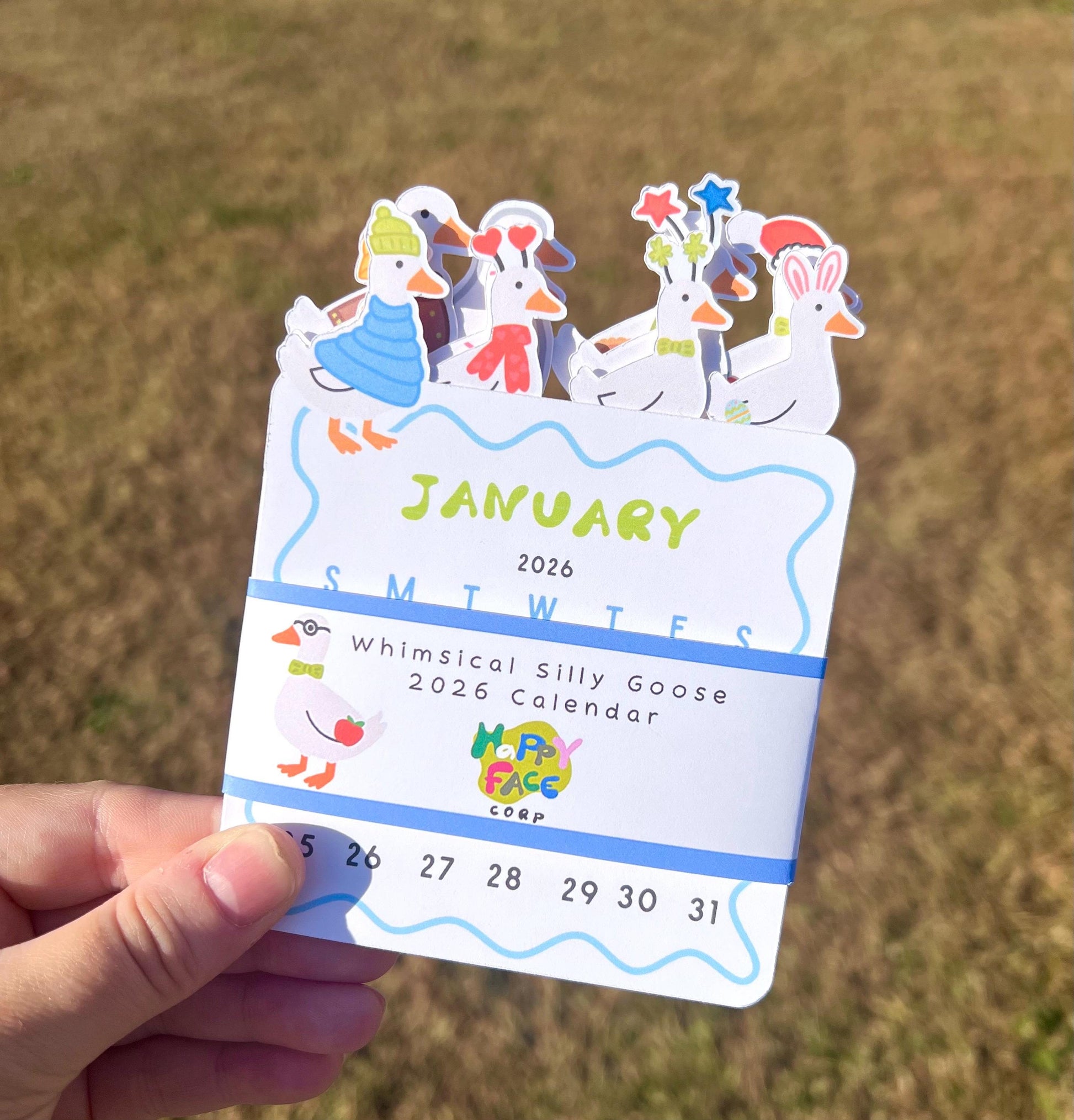 A 2026 mini desk calendar of silly goose dressed up for each month