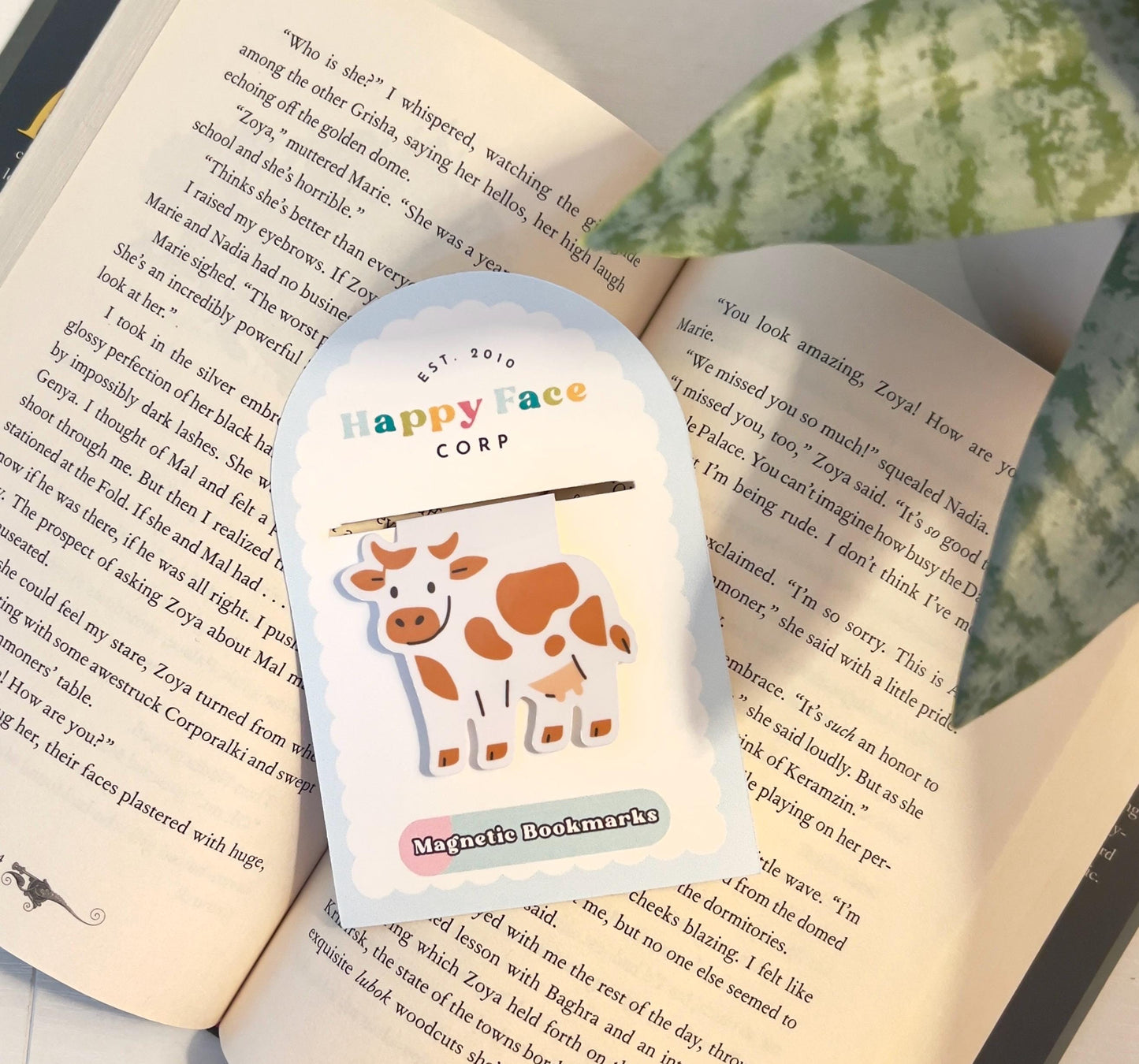 Packaging for the brown spotted cow bookmark