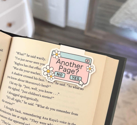 A magnetic bookmark of a cartoon style Windows computer pop-up that says just another page? Yes or no.