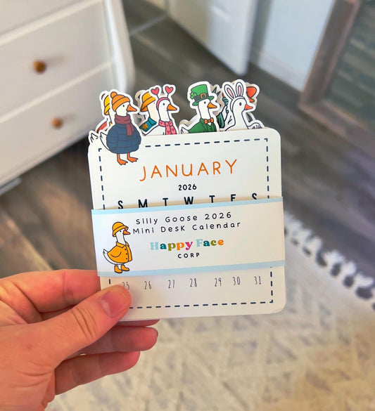 A 2026 silly goose mini desk calendar for the goose’s dress up for each month